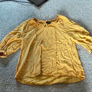 yellow dressy shirt. quarter sleeve.